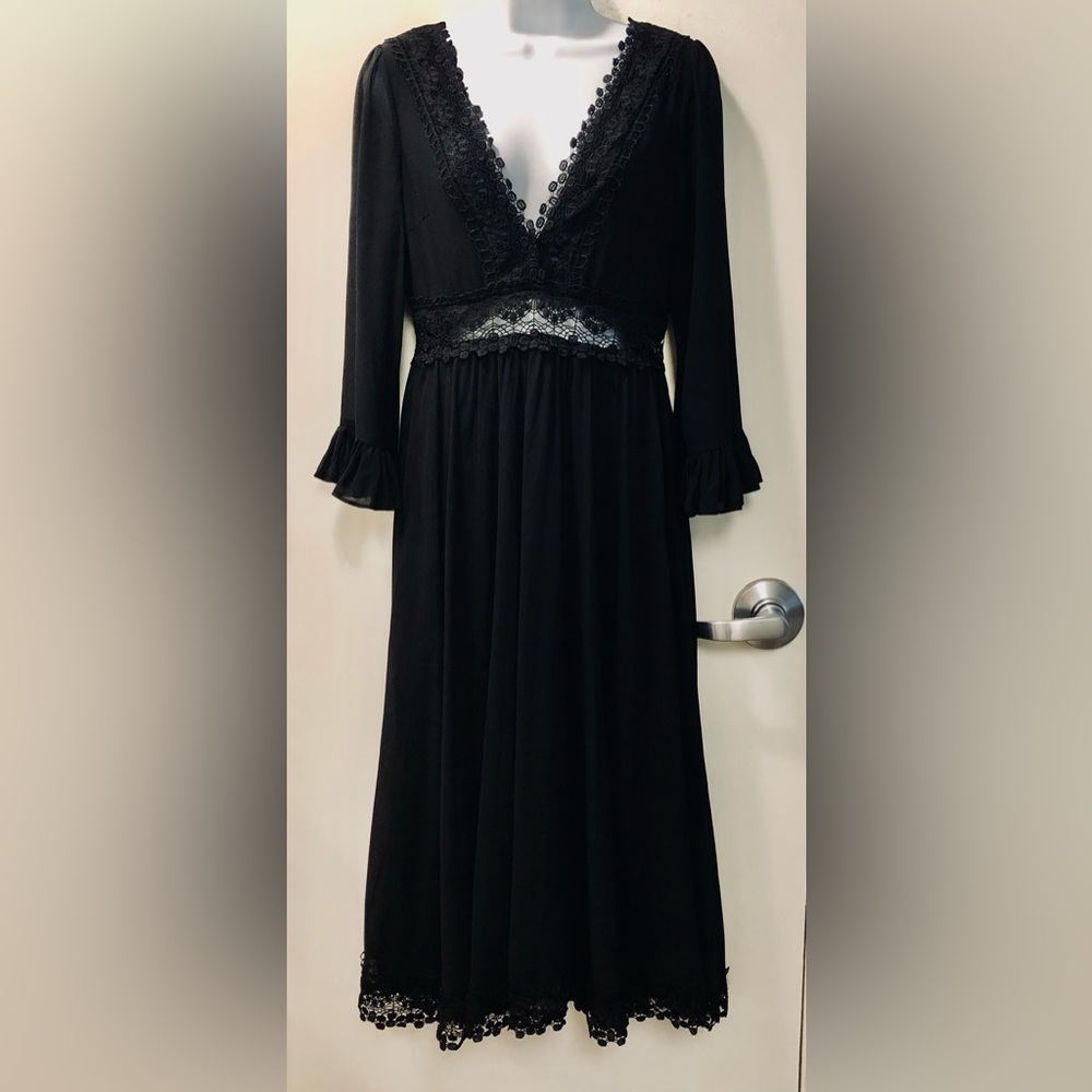 FOXBLOOD- Black full-skirted, laced dress.